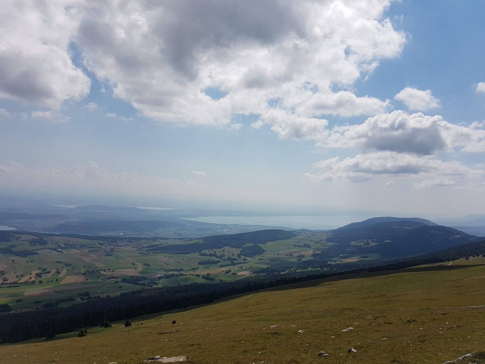 Panoramic view from Chasseral ridge over the Swiss lakes